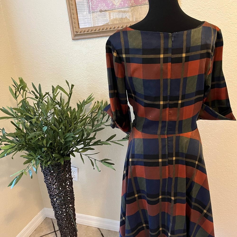 Beautiful plaid dress with asymmetrical hem.